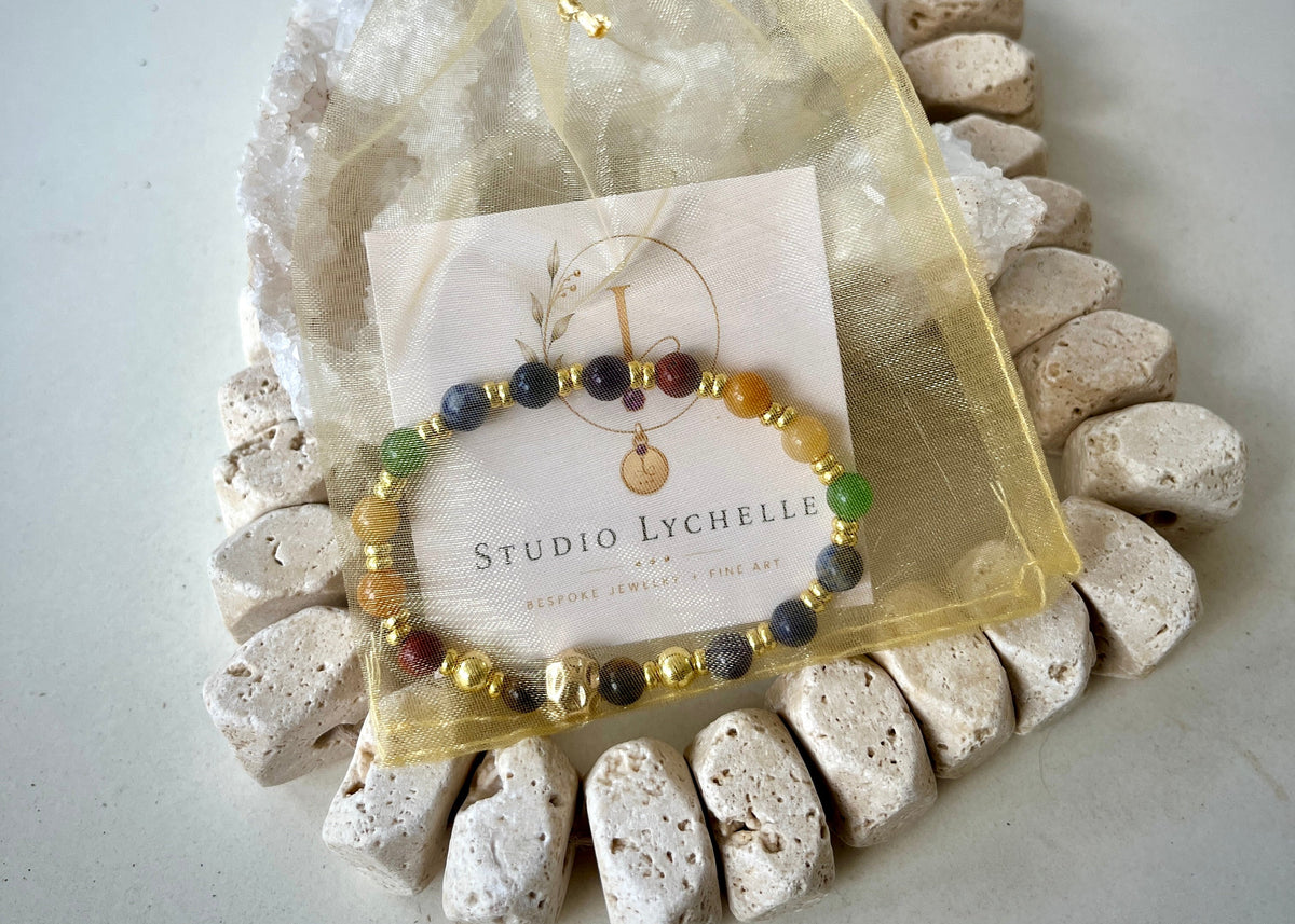 Chakra Bracelet with Gold Tone Beads